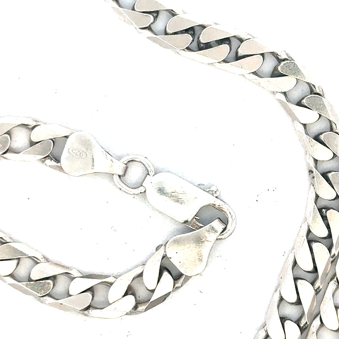 Silver curb chain weighing 31.3g, unbranded jewelry chain with a classic curb link design.