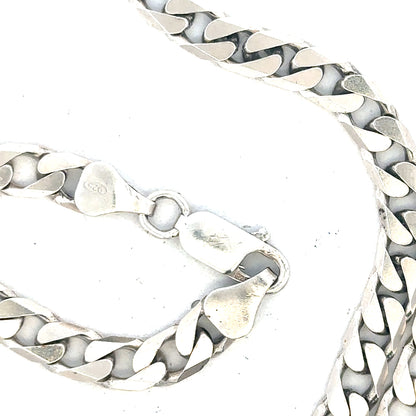 Silver curb chain weighing 31.3g, unbranded jewelry chain with a classic curb link design.