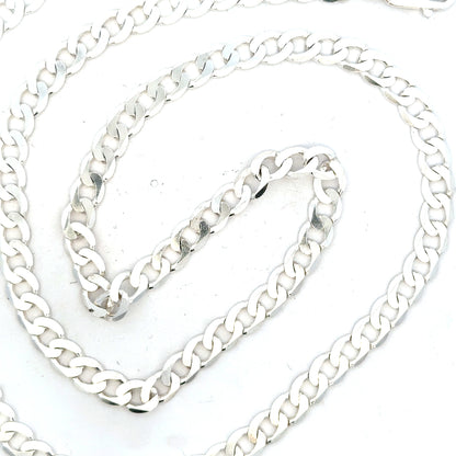 Silver curb chain weighing 34.5g, featuring a classic unbranded jewelry chain design with interlocking links.
