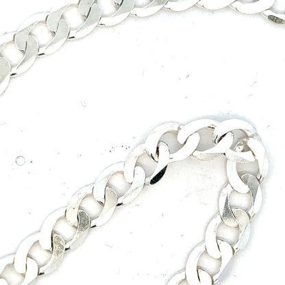 Silver curb chain weighing 34.5g, unbranded jewelry chain with a classic curb link design.