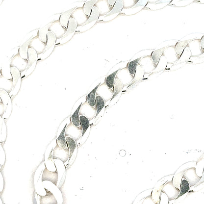 Silver curb chain weighing 34.5g, unbranded jewelry chain with classic curb link design, shown in a detailed close-up image.