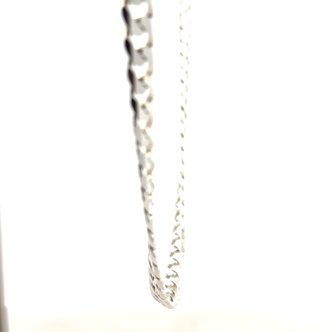 Silver curb chain weighing 44.6g, featuring interlocking links, suitable for jewelry or accessories, unbranded.