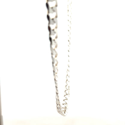 Silver curb chain weighing 44.6g, featuring interlocking links, suitable for jewelry or accessories, unbranded.