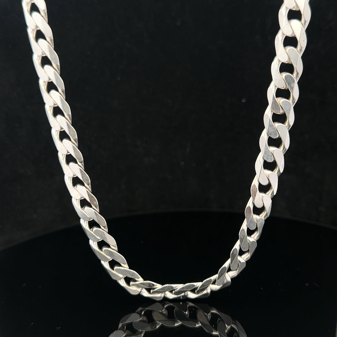 Silver curb chain weighing 60.4g, unbranded jewelry chain with a polished, linked design suitable for necklaces or bracelets.