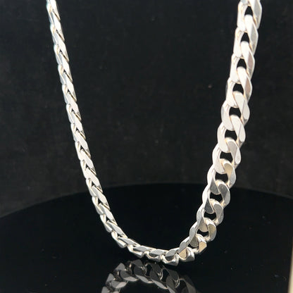 Silver curb chain weighing 60.4g, featuring classic linked design, crafted for durable and stylish jewelry.