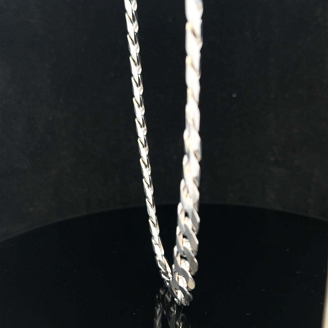 Silver curb chain with a polished finish, weighing 60.4g, displayed on a neutral background.