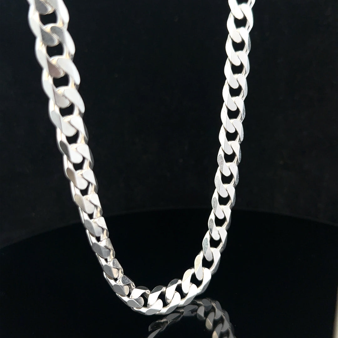 Silver curb chain weighing 60.4g, featuring a classic linked design, ideal for jewelry or accessories.