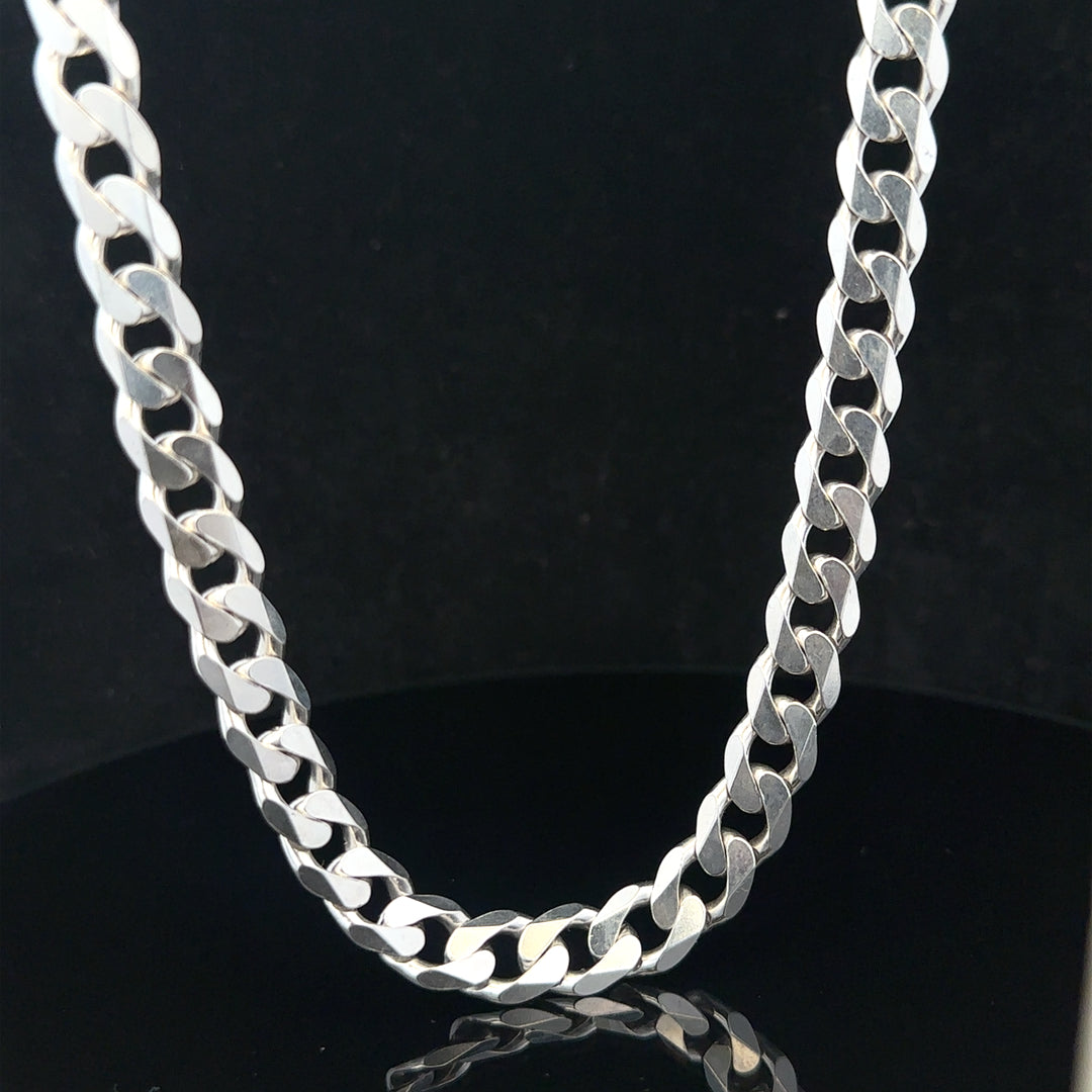 Silver curb chain weighing 60.4g, unbranded jewelry chain with a classic curb link design.