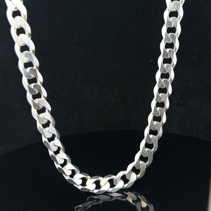 Silver curb chain weighing 60.4g, unbranded jewelry chain with a classic curb link design.