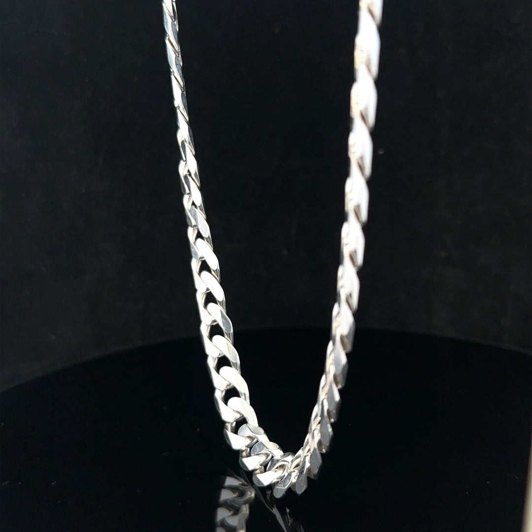 Silver curb chain weighing 60.4g, unbranded jewelry chain with a classic curb link design, displayed on a neutral background.