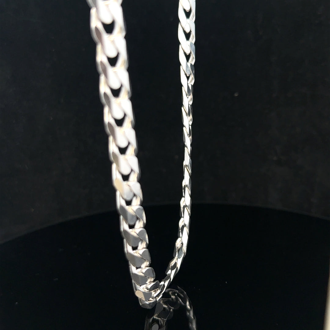 Silver curb chain weighing 60.4g, unbranded jewelry chain with a polished finish and classic curb link design.
