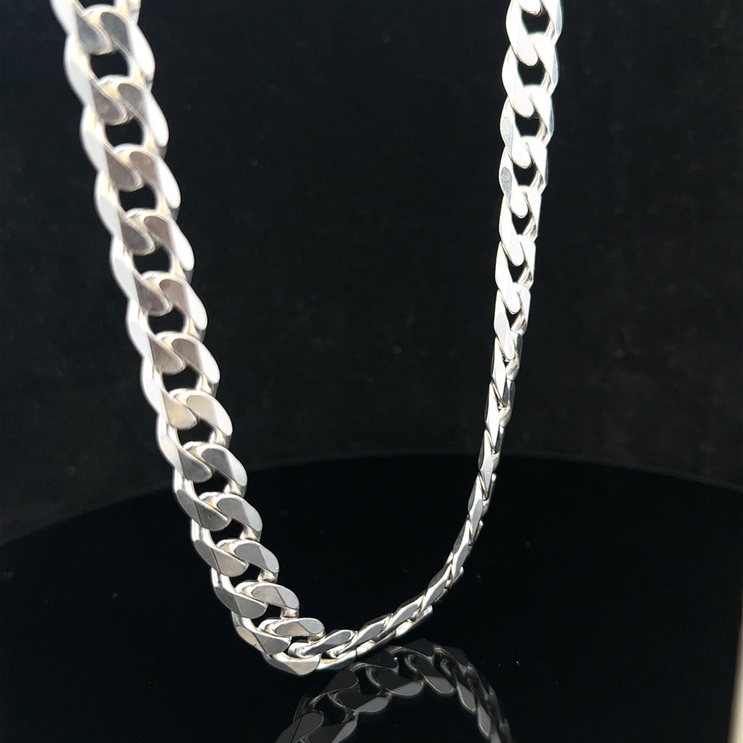 Silver curb chain weighing 60.4g, unbranded jewelry chain with a classic curb link design, displayed on a plain background.