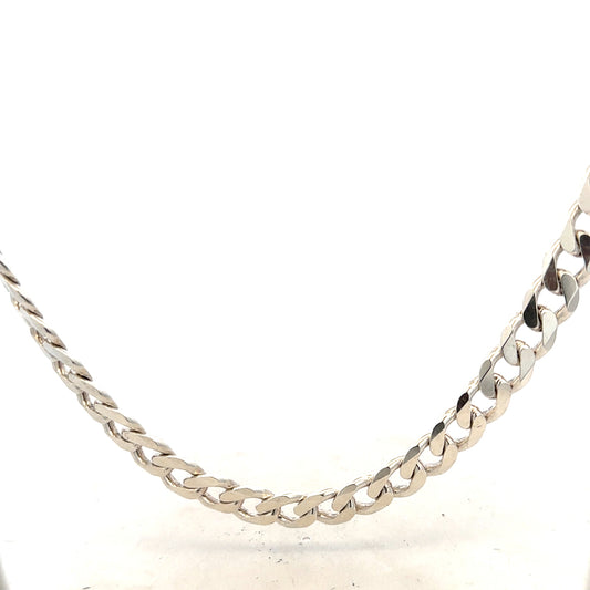 Silver curb chain weighing 66.7g with a classic design, shown in a close-up image highlighting its polished links.