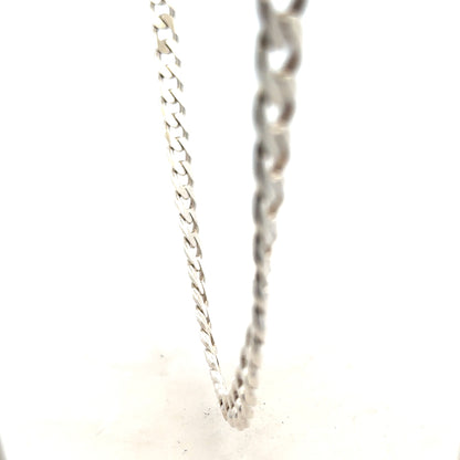 Silver curb chain weighing 66.7g, unbranded jewelry chain with a classic curb link design, showcased in the image.