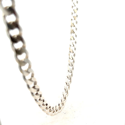 Silver curb chain weighing 66.7g, unbranded jewelry chain with a sleek, interconnected curb link design.