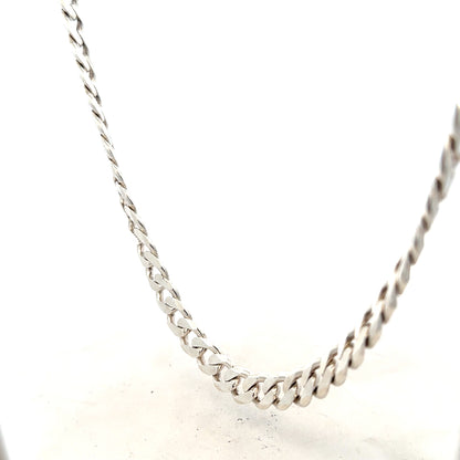 Silver curb chain weighing 66.7g, featuring classic interlinked design, showcased on a plain background.