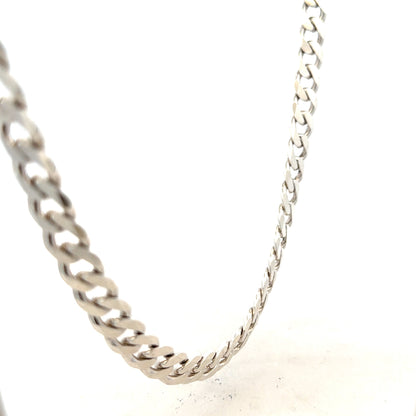 Silver curb chain weighing 66.7g, unbranded jewelry chain with a classic curb link design, shown in a close-up image.