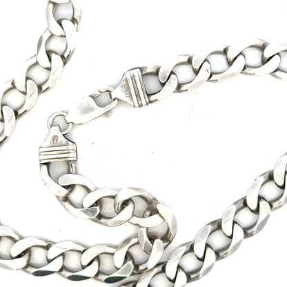 Silver curb chain, unbranded, 80.2g, with a classic link design, shown in a close-up image highlighting its polished finish.
