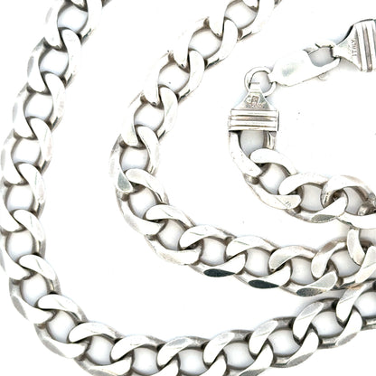 Silver curb chain weighing 80.2g, featuring a classic link design, suitable for jewelry making or wearing.