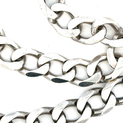 Silver curb chain, unbranded, weighing 80.2g, with a classic linked design, shown on a plain background.