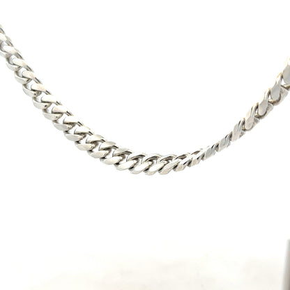 Silver curb chain weighing 81.2g, showcasing a sleek, polished design with interlocking links, ideal for jewelry or accessories.