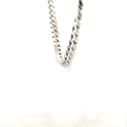 Silver curb chain weighing 81.2g, featuring classic linked design, on a plain background.