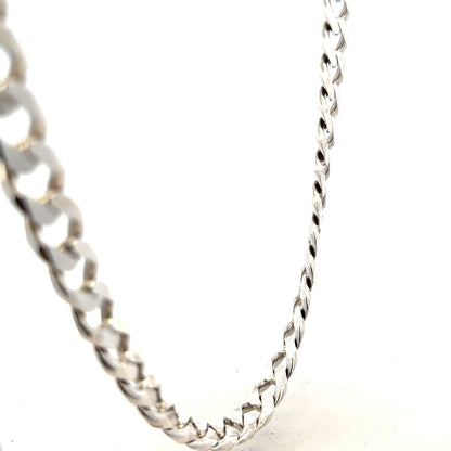Silver curb chain weighing 91.8g, showcasing a sleek, interconnected link design, ideal for jewelry or accessories.