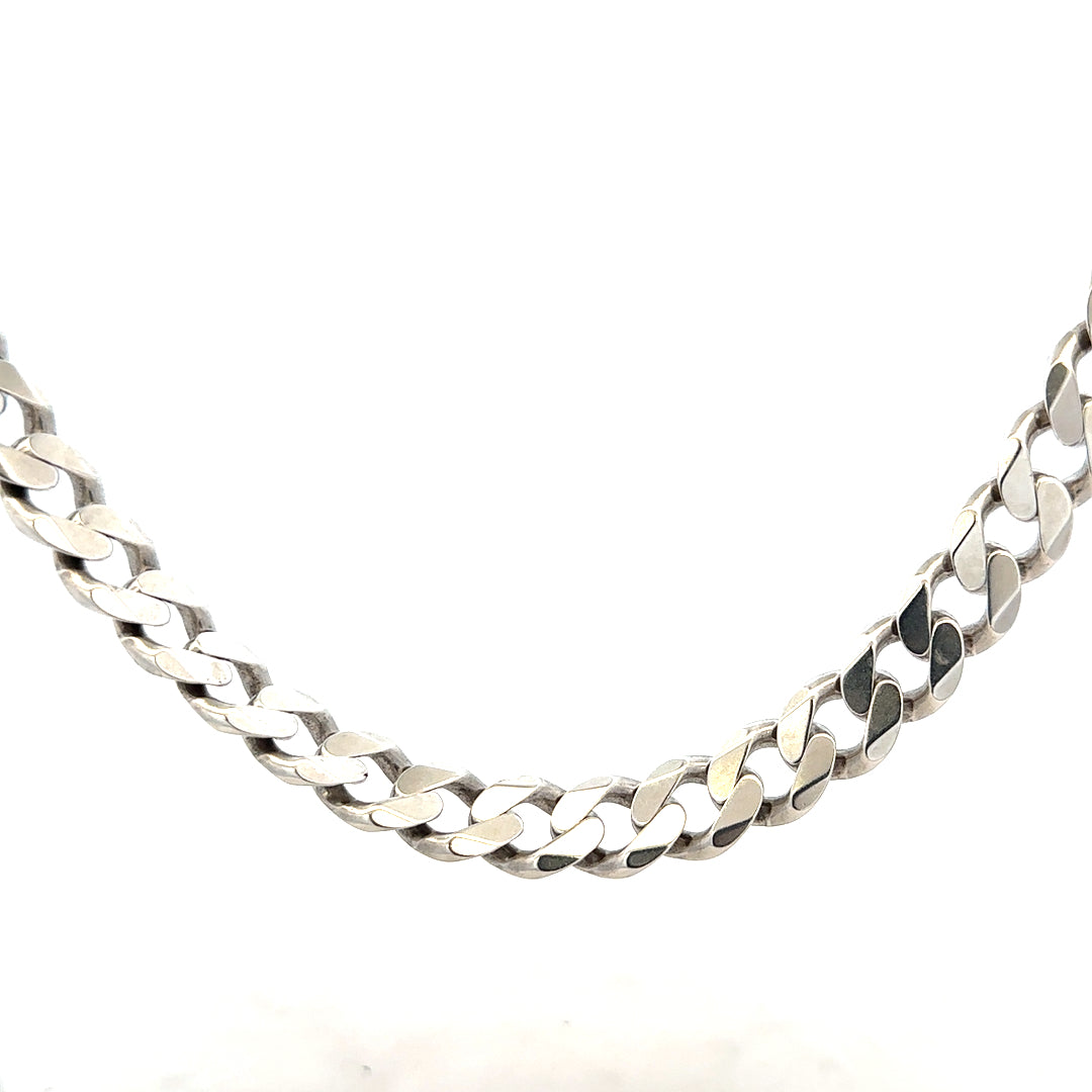 Silver curb chain, unbranded, weighing 94.7g, with thick interconnected links, displayed against a neutral background.