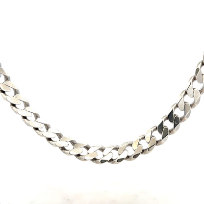 Silver curb chain, unbranded, weighing 94.7g, with thick interconnected links, displayed against a neutral background.