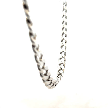 Silver curb chain weighing 94.7g, featuring classic link design, ideal for jewelry or accessory use.