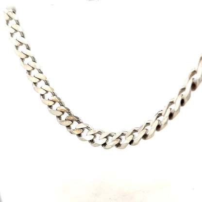 Silver curb chain weighing 96.3g with a classic design, showcased in a detailed image highlighting its links and shine.
