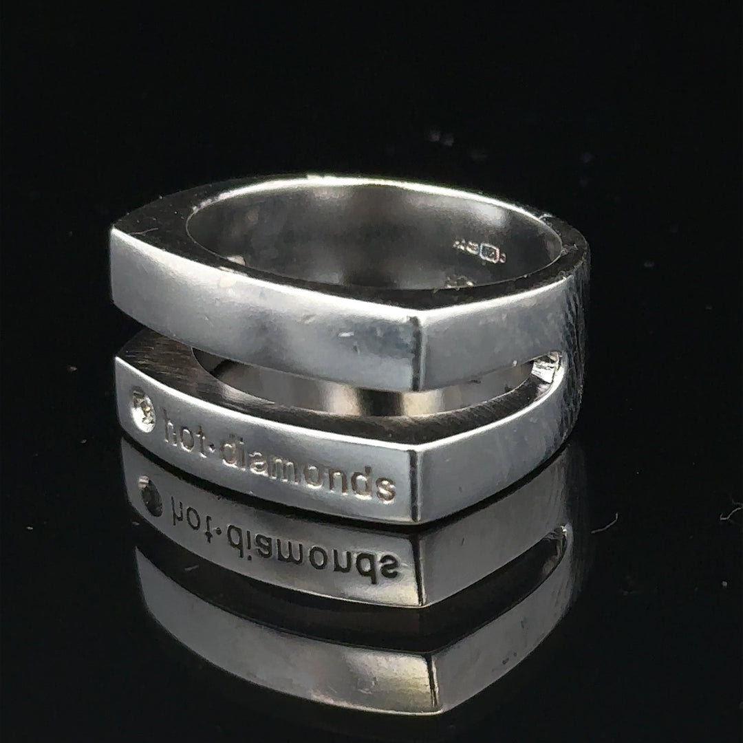 Silver hot diamond ring in size R1/2, featuring a sleek design with sparkling diamonds, unbranded jewelry ring.