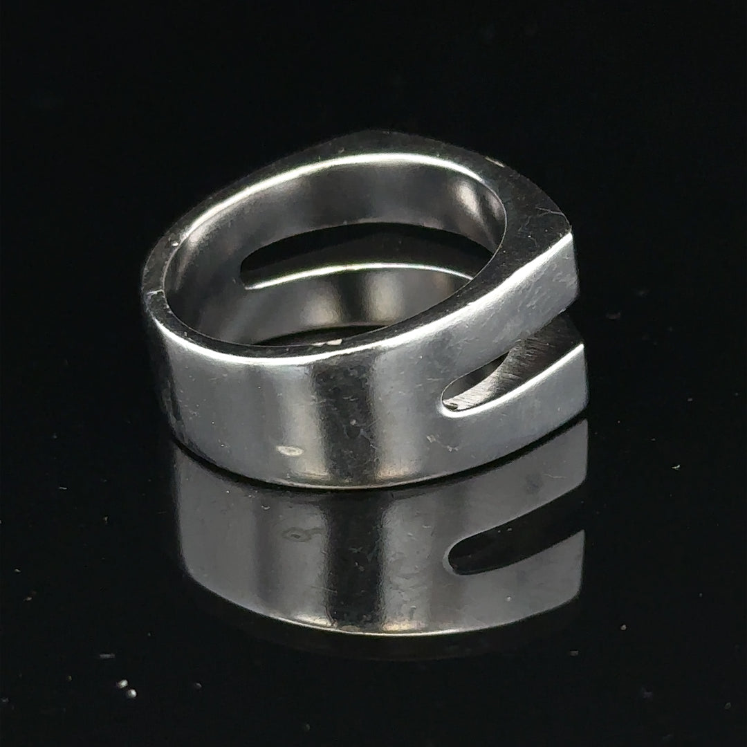 Silver hot diamond ring size R1/2 with sparkling diamonds, showcasing a sleek band and intricate design.