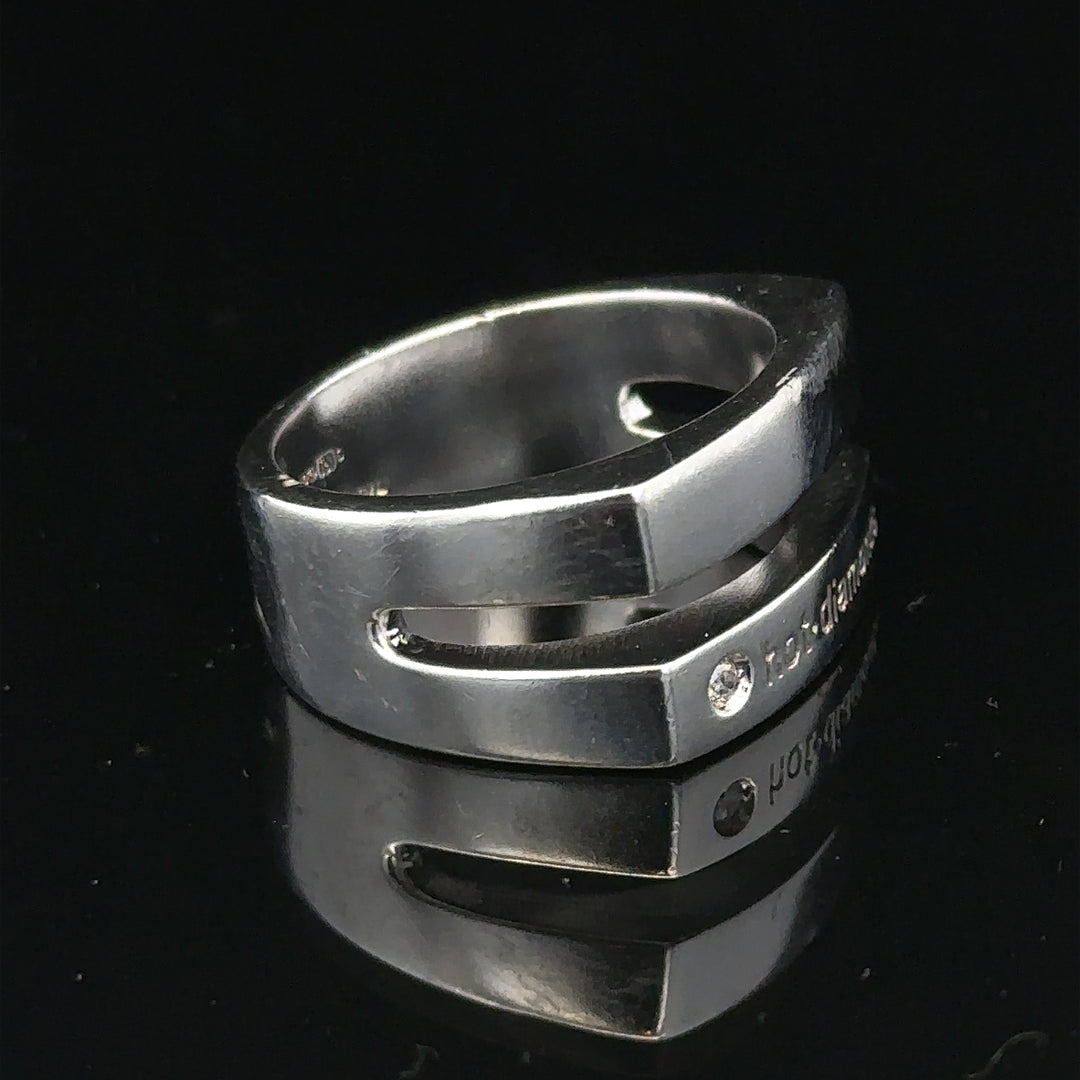 Silver hot diamond ring in size R1/2 featuring a sparkling diamond set on a sleek band.
