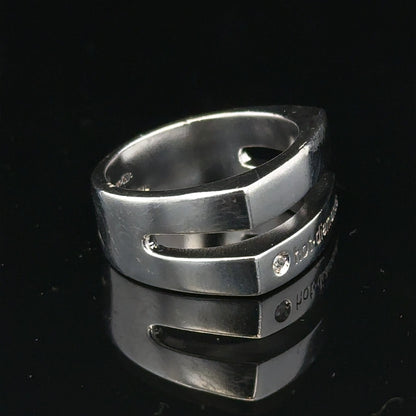 Silver hot diamond ring in size R1/2 featuring a sparkling diamond set on a sleek band.