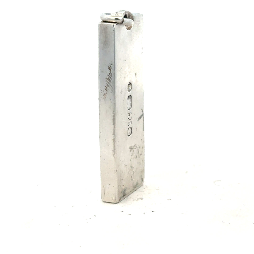 Silver ingot pendant, 31g, unbranded, with a polished rectangular design, displayed against a plain background.