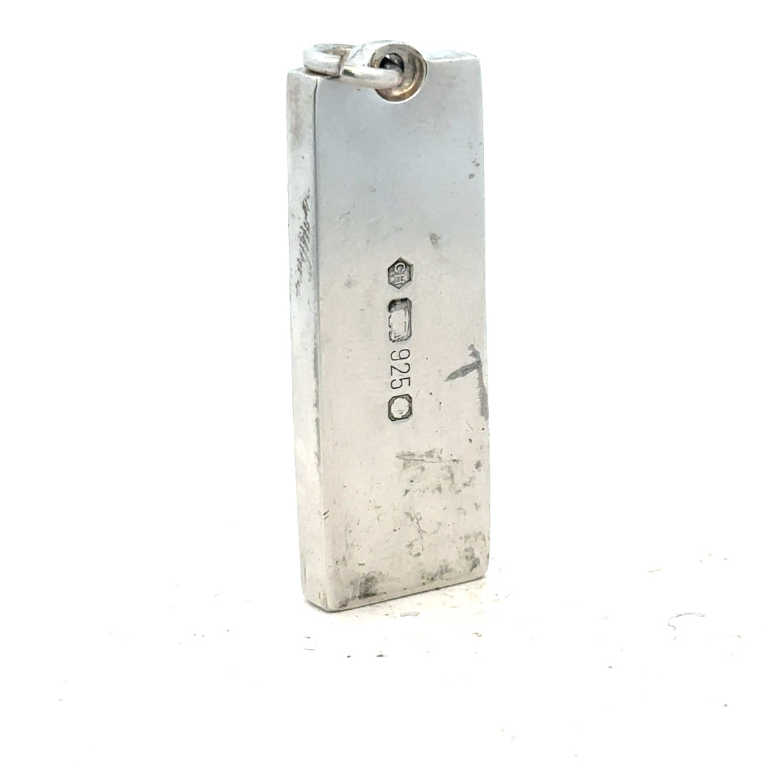Silver ingot pendant, 31g, unbranded, showcases a polished, rectangular silver pendant with a loop for necklace attachment.