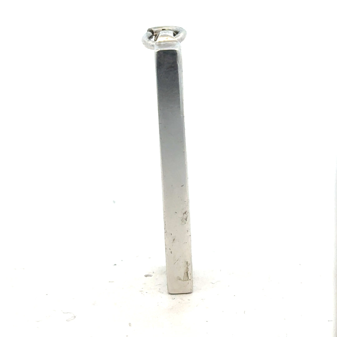 Silver ingot pendant, unbranded 31g, polished metal jewelry piece with a sleek rectangular shape and smooth surface.