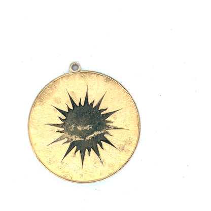 Silver pendant weighing 25.4g, unbranded with a sleek, polished finish, shown hanging on a delicate chain.