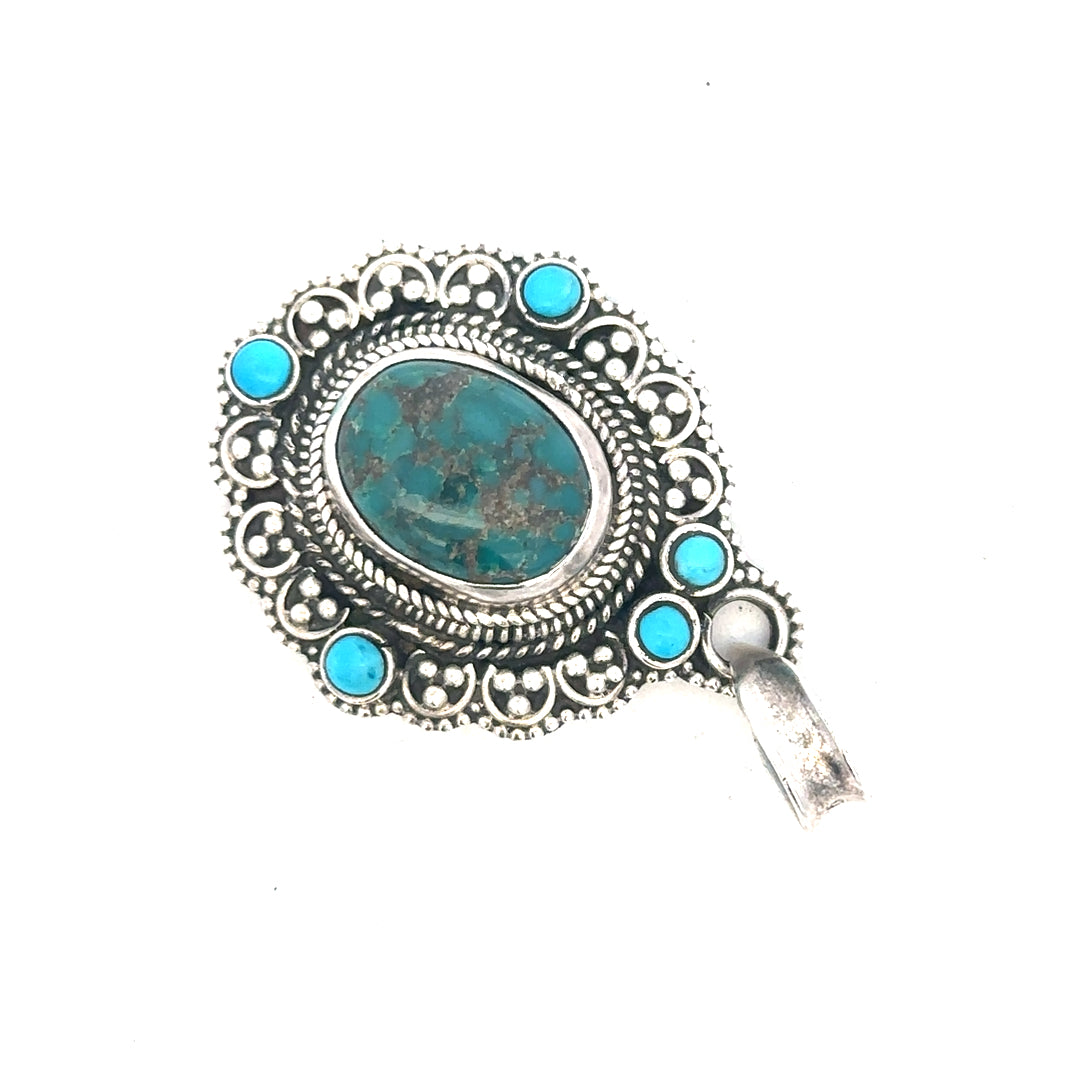 Silver pendant weighing 15.9g, with a sleek, polished finish, shown on a neutral background. Unbranded jewelry accessory.
