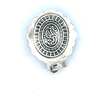 Silver pendant weighing 15.9g, unbranded jewelry piece with a polished finish, shown on a plain background.