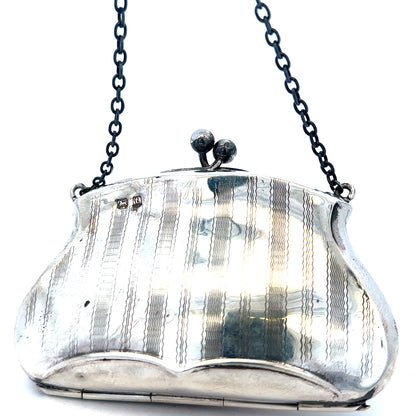Silver purse pendant weighing 66.2g, unbranded jewelry accessory with detailed design, suitable for necklaces or charms.
