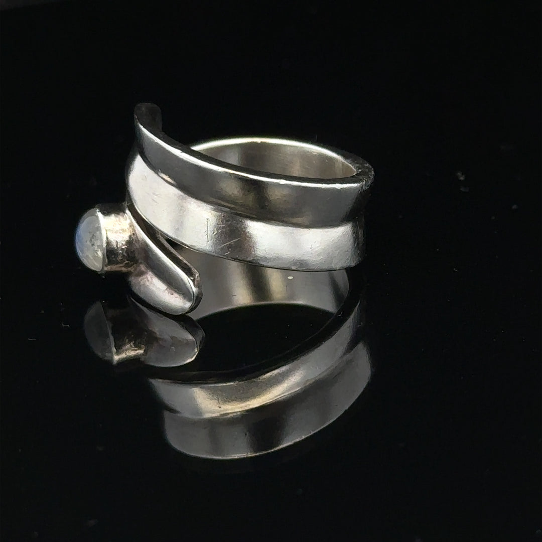 Silver ring in size R with a sleek, polished design, featuring a simple band suitable for everyday wear.