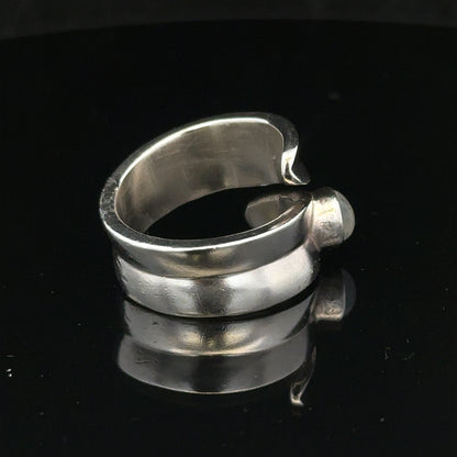 Silver ring size R with a sleek band, unbranded, shown on a plain background in this product image.