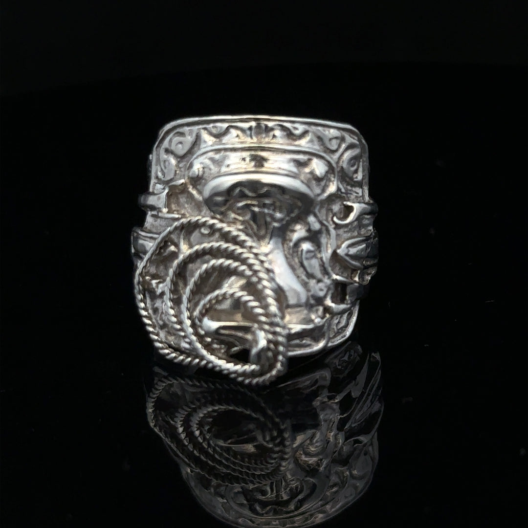 Silver saddle ring in size V with smooth design, unbranded, featuring a shiny silver finish and a classic saddle shape.