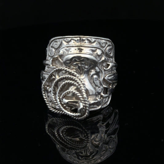 Silver saddle ring in size V with smooth design, unbranded, featuring a shiny silver finish and a classic saddle shape.