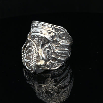 Silver saddle ring in size V, unbranded, featuring a smooth, polished design suitable for everyday wear.