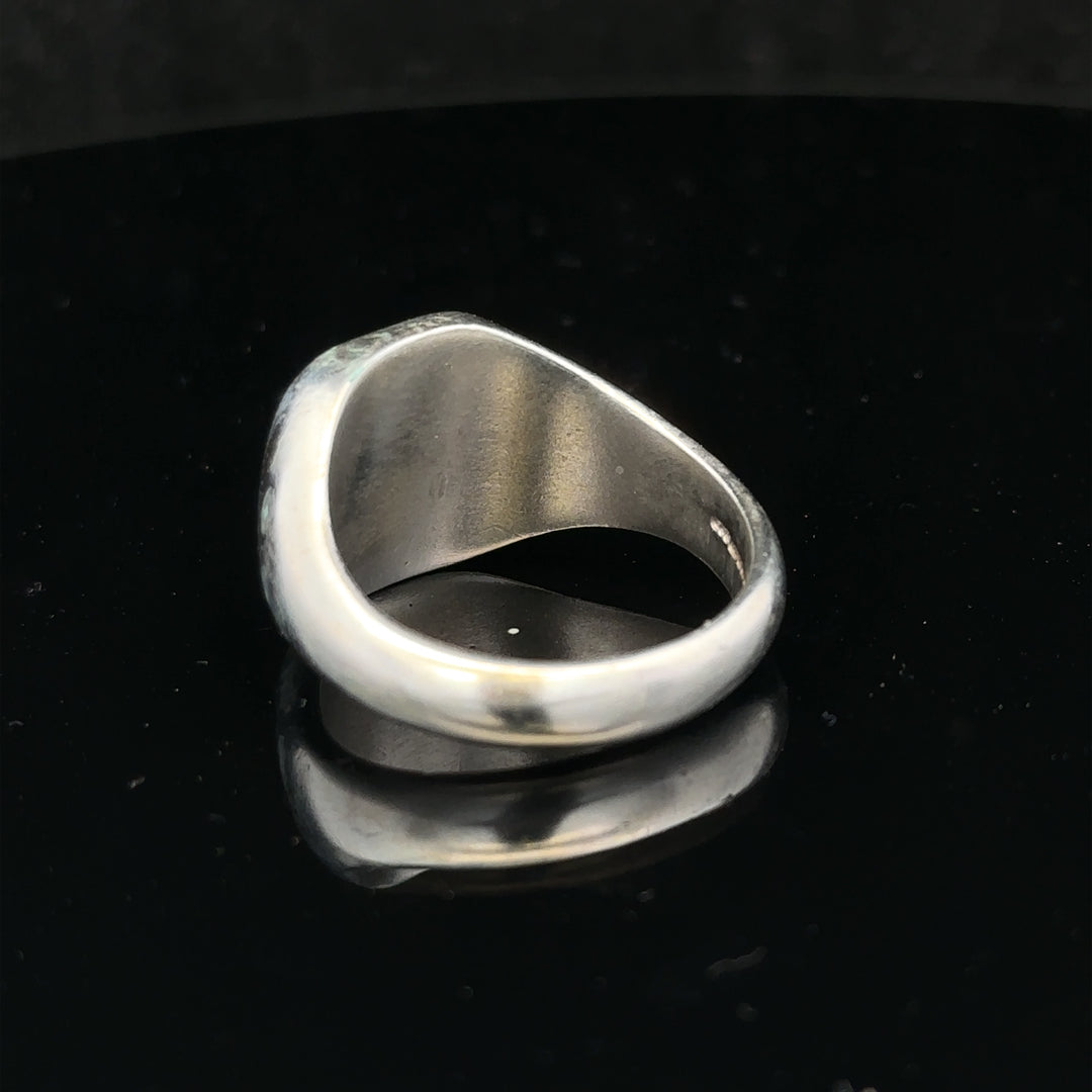 Silver signet ring in size V with a smooth, polished finish, unbranded jewelry accessory for men or women.