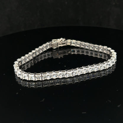 Silver tennis bracelet weighing 15.6g, unbranded jewelry with a sleek, elegant design and secure clasp, perfect for everyday wear.