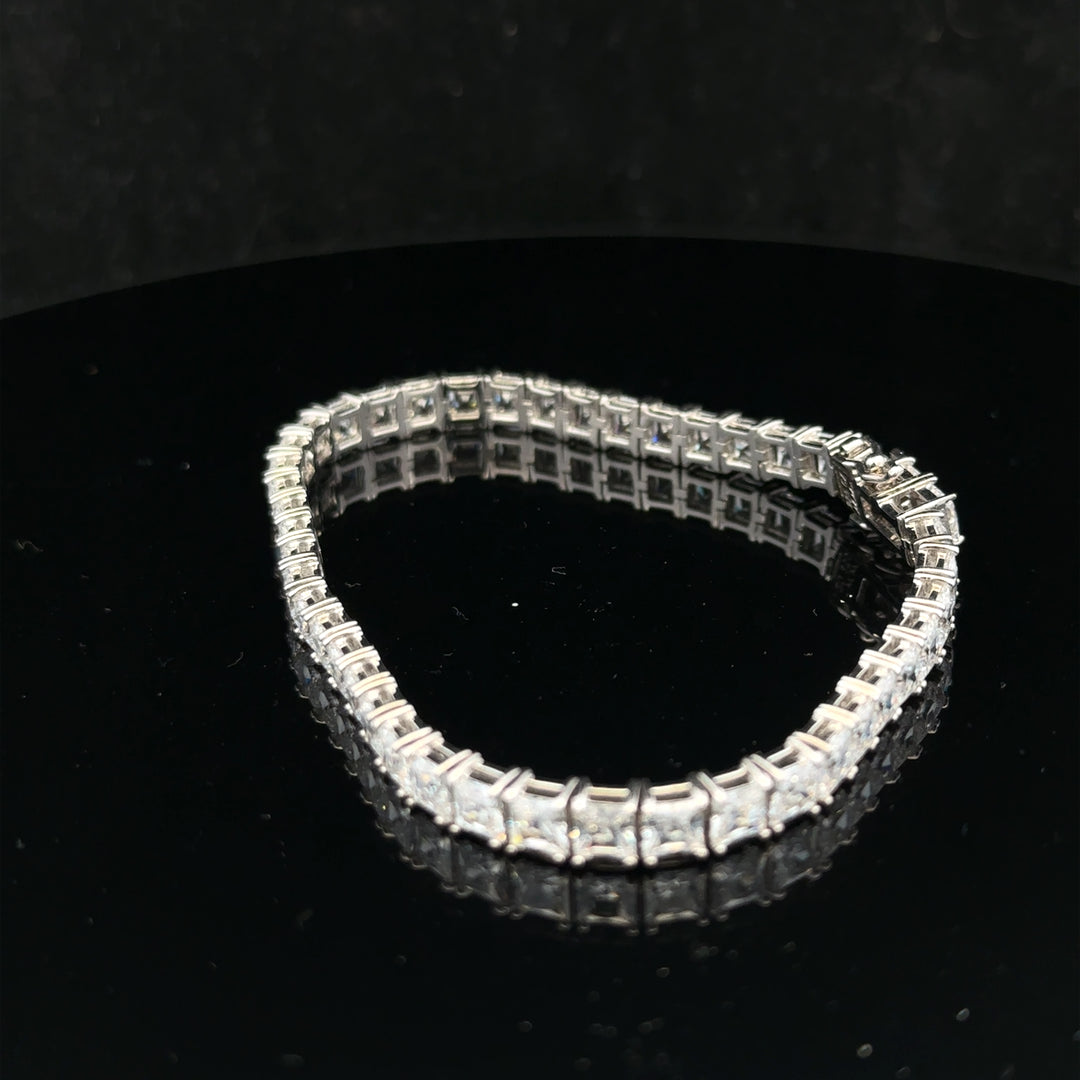 Silver tennis bracelet weighing 15.6g with a sleek, elegant design, featuring closely linked chain links for a sophisticated look.